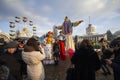 Kiev, Ukraine - February 17, 2018: Residents near a traditional doll as a decoration for the celebration of the Slavic holiday