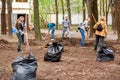 Kiev, Ukraine 16.04.2016 a group of people teenagers doing spring cleaning in the park. teens at community work outdoors