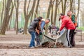 Kiev, Ukraine 16.04.2016 a group of people doing spring cleaning in the park