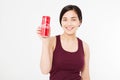 KIEV, UKRAINE - 06.28.2018: Happy asian, korean woman hold Coca Cola jar. Sweet water. Illustrative editorial. Copy space Royalty Free Stock Photo