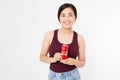 KIEV, UKRAINE - 06.28.2018: Happy asian, korean woman, girl holding Coca Cola jar. Sweet water. Illustrative editorial. Copy space