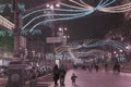 Kiev, Ukraine - January 04, 2020: Festive Khreschatyk street with decorative lights. People are walking along illuminated central