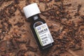 KIEV, UKRAINE - January 10, 2021: Oil of cloves in a glass bottle. Aura Cacia, 100% Pure Clove Bud Essential Oil Royalty Free Stock Photo