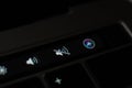Kiev, Ukraine - January 24, 2020: silent mode enable button on the MacBook Pro 2019 touch bar