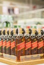 Kiev, Ukraine. July 15 2018. Bottles of Johnnie Walker Scotch whisky on store shelves for sale in Hypermarket. Whiskey on the shel Royalty Free Stock Photo