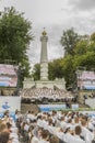 Kiev, Ukraine. July 22 2018 Christian choir of young men and girls in the park sing Christian songs and glorify God. vertical