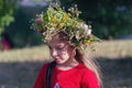 Kiev, Ukraine - July 06, 2017: Young girl in a wreath of flowers at the celebration of the traditional Slavic holiday of Ivan Kupa