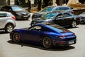 Kiev, Ukraine - June 12, 2021: Blue supercar Porsche 911 Carrera S in the city
