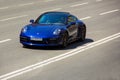 Kiev, Ukraine - June 19, 2021: Blue supercar Porsche 911 Carrera S in the city