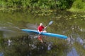 Kiev, Ukraine - June 12, 2016: An elderly man is floating on a canoe