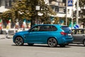 Kiev, Ukraine - June 12, 2021: German SUV BMW X5 M in the city on the road. BMW in motion