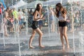Kiev, Ukraine - June 10, 2018: Girls bathe in the fountain Royalty Free Stock Photo