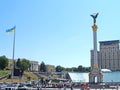 KIEV, UKRAINE. Independence Monument and the national flag of Ukraine on Independence Square Maidan of Independence Royalty Free Stock Photo