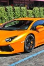 Kiev, Ukraine - June 17, 2012: Lamborghini Aventador on the street. Orange supercar