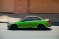 Kiev, Ukraine - June 19, 2021: Mercedes-Benz C Class W204 in chameleon color in the city. Mercedes in motion