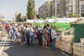 Kiev, Ukraine - June 10, 2018 People stand in a long queue for food in the market Royalty Free Stock Photo