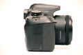 Kiev, Ukraine - June 24th, 2020: Canon 1300d dSLR camera camera with 50 mm 1.8 EF prime lens. Right view snapshot on white