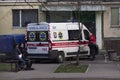 Kiev, Ukraine - March 26, 2020: Ambulance near the entrance of an house