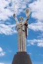 Kiev, Ukraine - March, 2019: The Famous Mother Motherland Monument Also Known as Rodina Mat on a Blue Sky