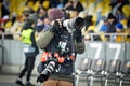 Kiev, UKRAINE - March 14, 2019: Journalists and photographers work and take photos during the UEFA Europa League match between