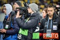 Kiev, UKRAINE - March 14, 2019: Journalists and photographers work and take photos during the UEFA Europa League match between