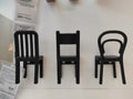 KIEV, UKRAINE - March 06, 2021: original clothes hangers in the form of different chairs,