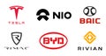 Kiev, Ukraine - March 07, 2021: Set electric car company logos. Collections electric driving car manufacturer: Tesla, Nio, BAIC,