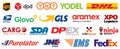 Kiev, Ukraine - March 12, 2023: Set popular delivery courier services icons, logo company: Fedex, TNT, Glovo, DHL, UPS, USPS, DPD Royalty Free Stock Photo