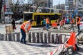 KIEV, UKRAINE, MARCN, 2017: Workers laying paving tiles, Kiev,