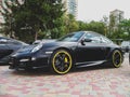 Kiev, Ukraine - May 14, 2011: Black supercar Porsche 911 997 Turbo TechArt GT Street in the city