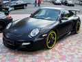 Kiev, Ukraine - May 14, 2011: Black supercar Porsche 911 997 Turbo TechArt GT Street in the city