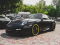 Kiev, Ukraine - May 14, 2011: Black supercar Porsche 911 997 Turbo TechArt GT Street in the city