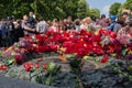 Kiev, Ukraine - May 9, 2016: Citizens lay flowers to the monument to the fallen soldiers