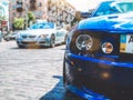 Kiev, Ukraine - May 14, 2011: Ford Mustang Saleen S281 Supercharged and BMW M6 in the city Royalty Free Stock Photo