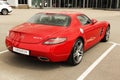 Kiev, Ukraine - May 19, 2020: Luxury supercar Mercedes-Benz SLS AMG in the background of a building. Parked car