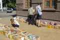 Kiev, Ukraine - May 19, 2019: Peoples buy old books at a flea market on street