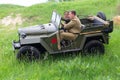 Kiev, Ukraine - May 9, 2018: Reconstructors on the Soviet-made off-road vehicle GAZ-67 Royalty Free Stock Photo