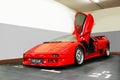 Kiev, Ukraine - May 22, 2021: Red luxury supercar Lamborghini Diablo Koenig with open door. Exclusive red supercar Royalty Free Stock Photo