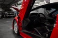 Kiev, Ukraine - May 22, 2021: Red luxury supercar Lamborghini Diablo Koenig with open door. Exclusive red supercar Royalty Free Stock Photo