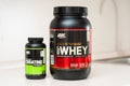 Kiev, Ukraine - May 31, 2020: Two optimum nutrition whey protein gold standard products with strawberry flavor and creatine powder