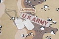 KIEV, UKRAINE - May. 02, US ARMY airborne tab with blank dog tags on camouflage uniform Royalty Free Stock Photo