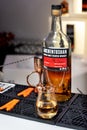 Kiyv, Ukraine, November 22, 2020. The Bottle of Auchentoshan `American Oak` single malt Scotch Whiskey and tulip-shaped glass