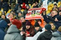 KIEV, UKRAINE - November 29, 2018: Fans and ultras of FC Arsenal with poster support the team during the UEFA Europa League match