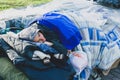 Ukraine, November 2019. Homeless old woman sleeping on a bench Royalty Free Stock Photo