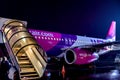 Kiev, Ukraine - November 18, 2017:People get on the plane of the company Wizz Air