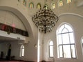 Large decorative beautiful chandelier with lots of lights in the Ar-Rahma mosque in Kiev