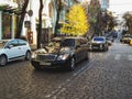 Kiev, Ukraine - October 23, 2010: Luxury cars Maybach S62 and Rolls-Royce Phantom Mansory Conquistador in motion. Autumn city
