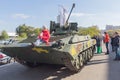 Kiev, Ukraine - October 14, 2016: Visitors view models of weapons in the exhibition