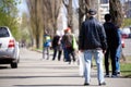 Kiev, Ukraine, 11.04.2020: A queue of people wearing medical masks at the entrance to the store for food. Everyone washes their Royalty Free Stock Photo