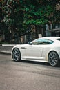 Kiev, Ukraine - September 2, 2017: Aston Martin DBS, white British supercar in the city